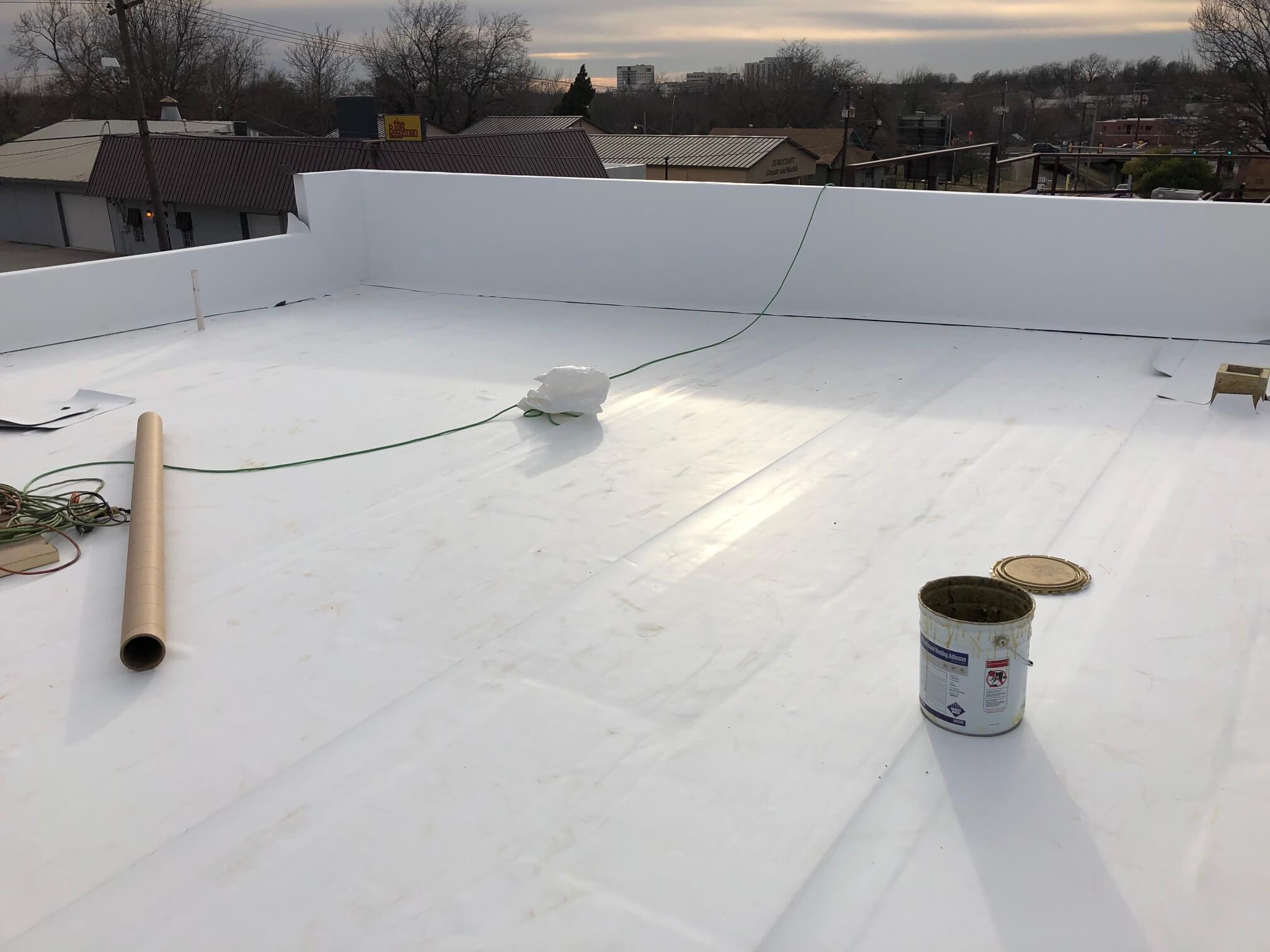 Men Replacing a Commercial Roof